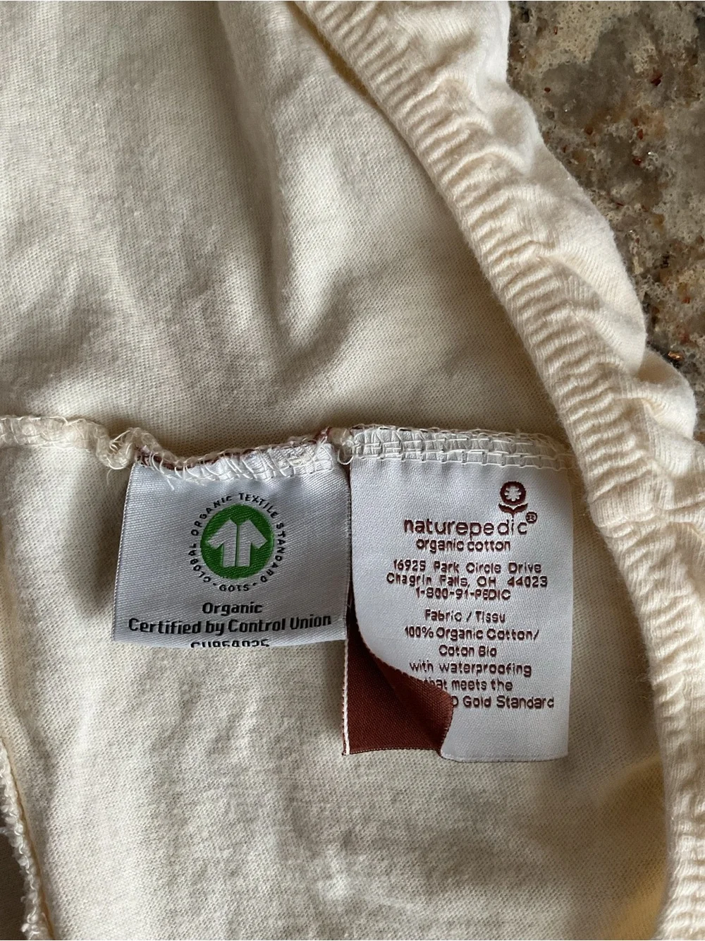 Organic cotton waterproof crib mattress protector by Naturepedic